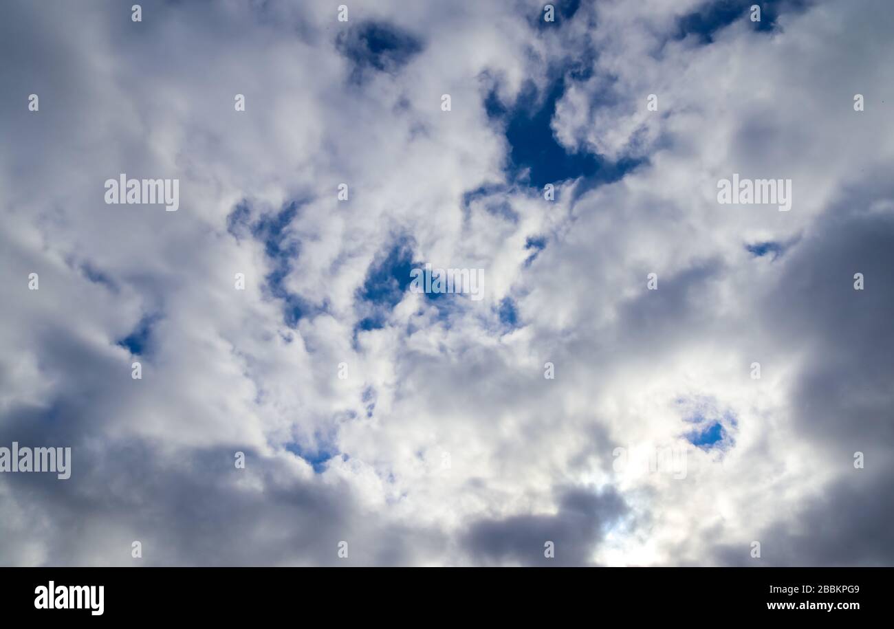 Beautiful white fluffy clouds in a blue sky on a sunny summer day Stock ...