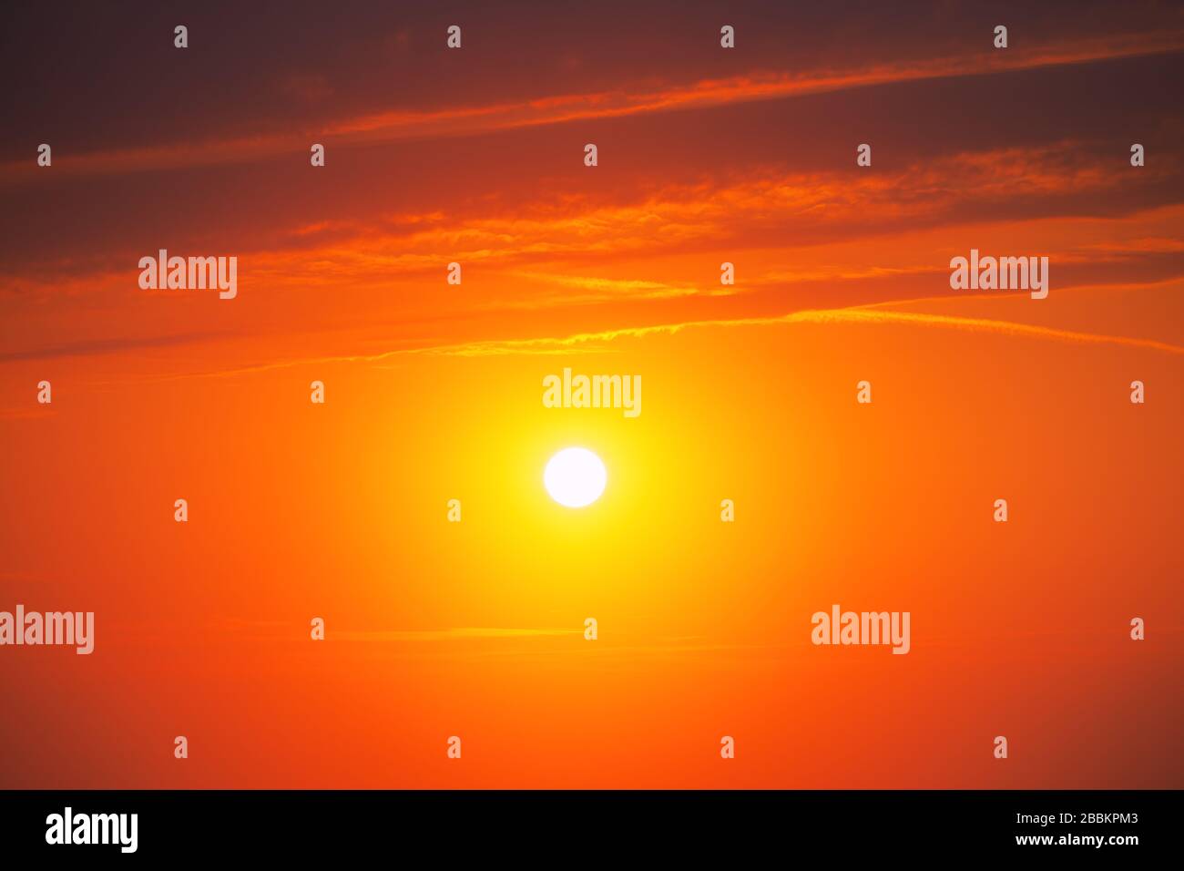 Orange sunrise  with clouds and sun Stock Photo