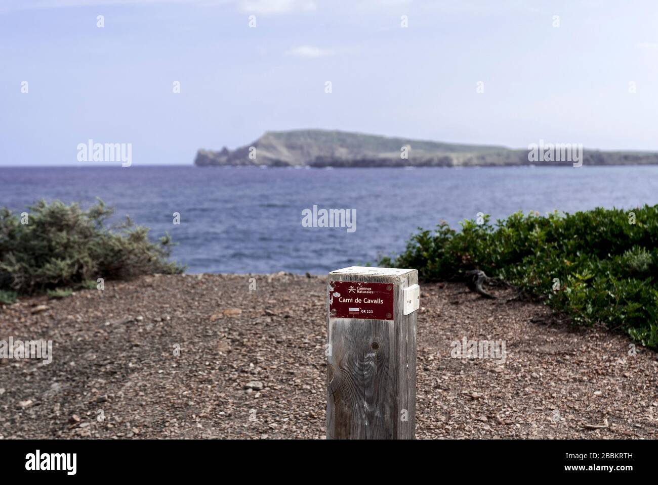 A wooden sign on the Cami de Cavalls (horses walk) coastal walk in Menorca island,2018. Stock Photo