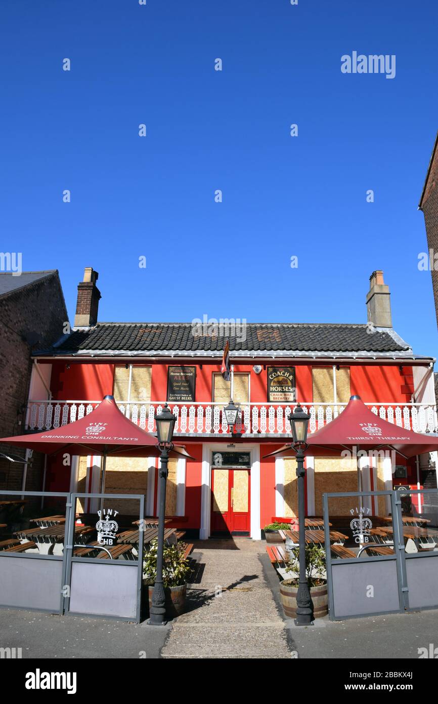 Popular local pub Coach & Horses closed during the Coronavirus lock down -  boarded up for security reasons. Norwich UK March 2020 Stock Photo - Alamy
