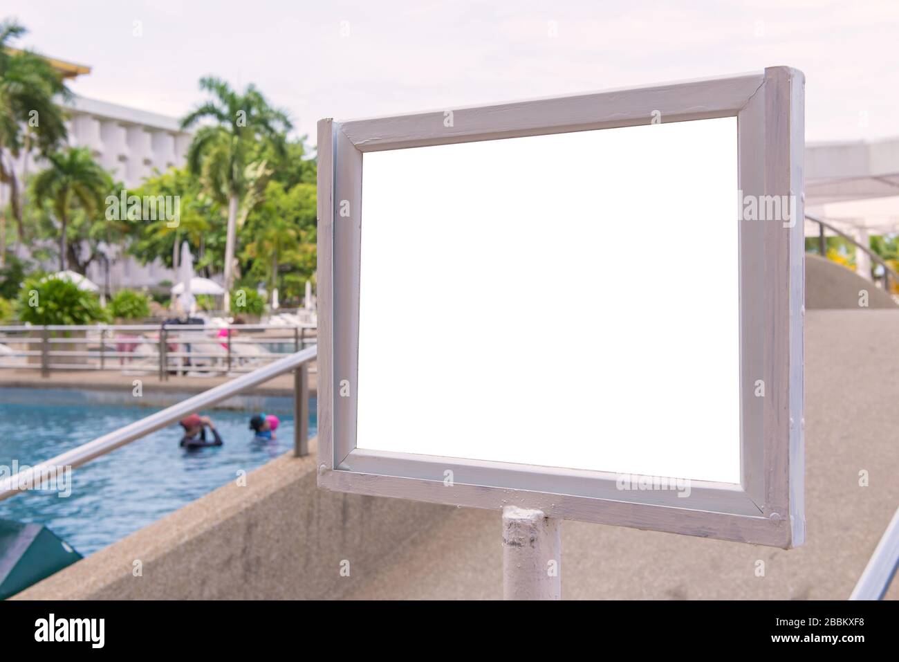 Empty Pool Sign empty of sign standing near a swimming pool Stock Photo - Alamy