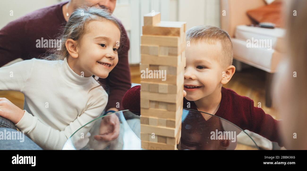 People playing at “Jenga Giant” at the game and toy fair of Quebec City -  La Revanche, board game, ExpoCité fair center Stock Photo - Alamy