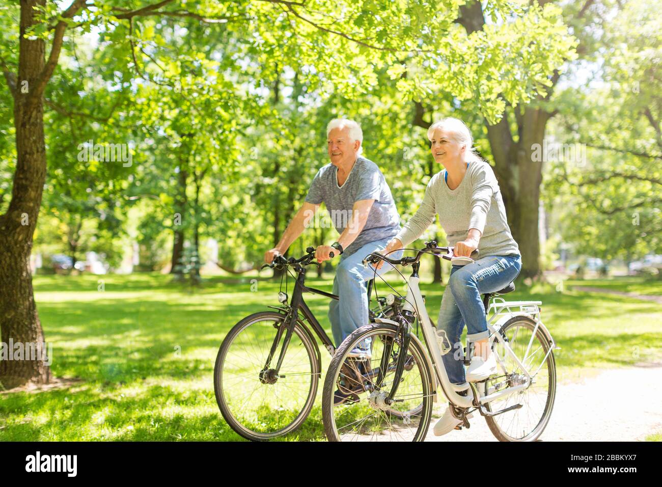 Senior couple on bicycles Stock Photo