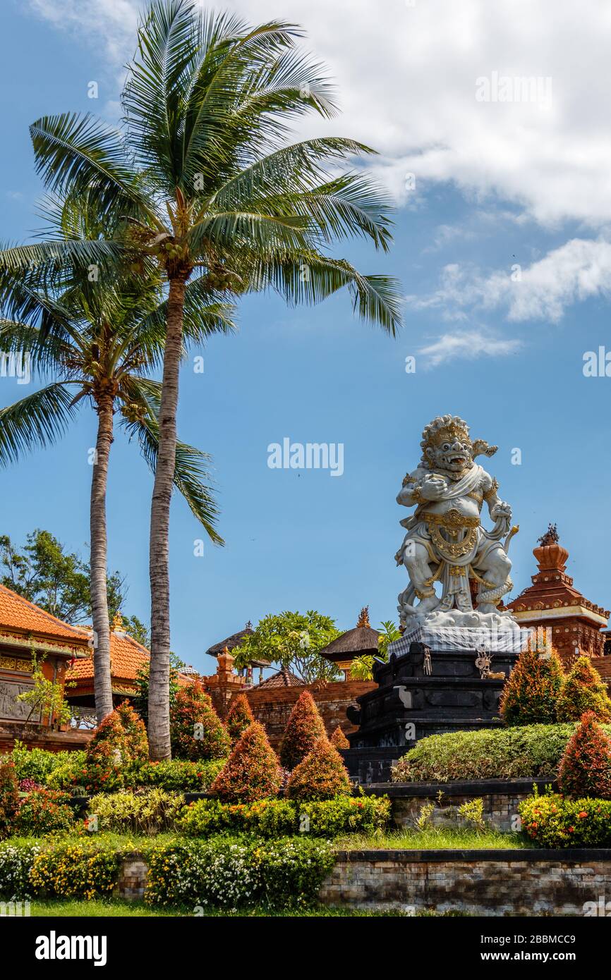 Statue of Buto Ijo, the guardian of Petitenget area near temple Pura  Petitenget. Bali, Indonesia. Square image Stock Photo - Alamy