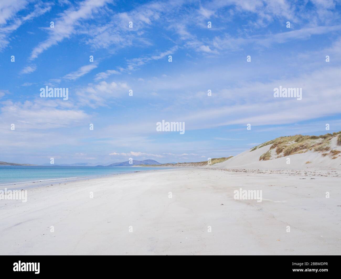 Miles of white sand and blue sea at West Beach, Isle of Berneray, Outer Hebrides, Western Isles, Scotland, UK Stock Photo