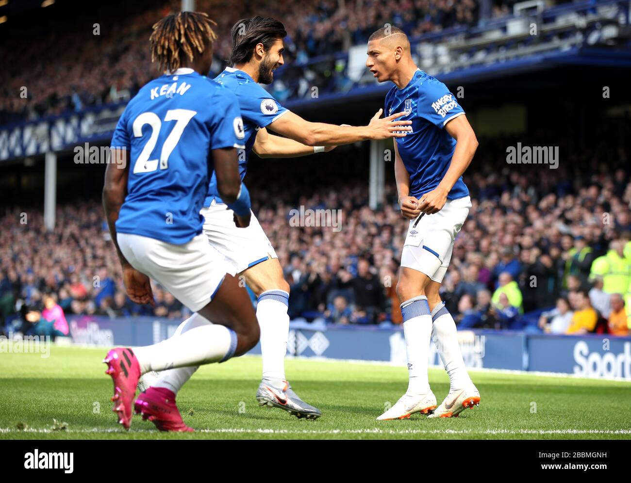Everton's Richarlison (right) celebrates scoring his side's first goal of the game with team-mates Stock Photo