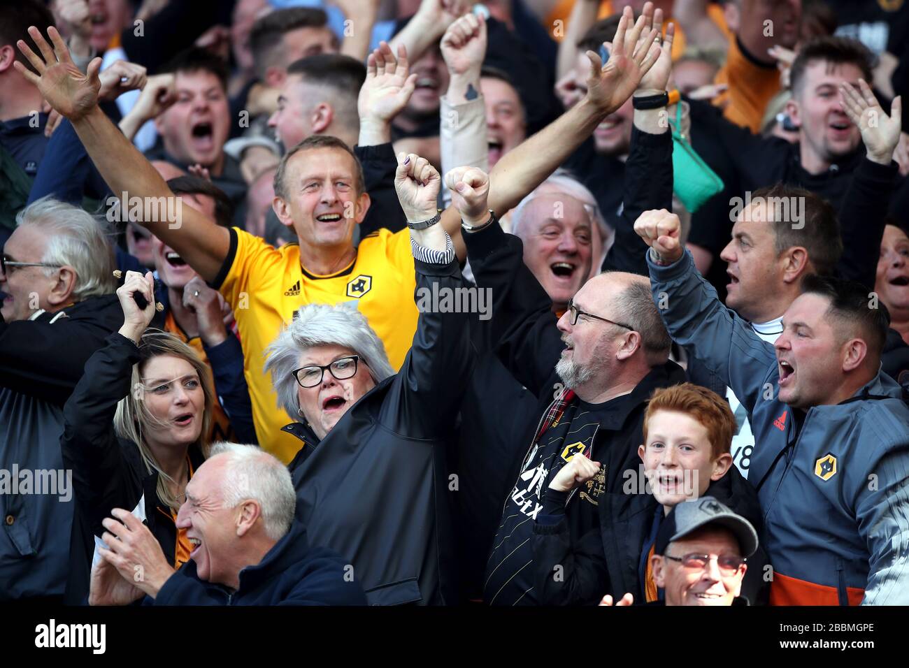 Wolverhampton Wanders fans celebrate their side's first goal of the game, scored by Romain Saiss (not pictured) Stock Photo