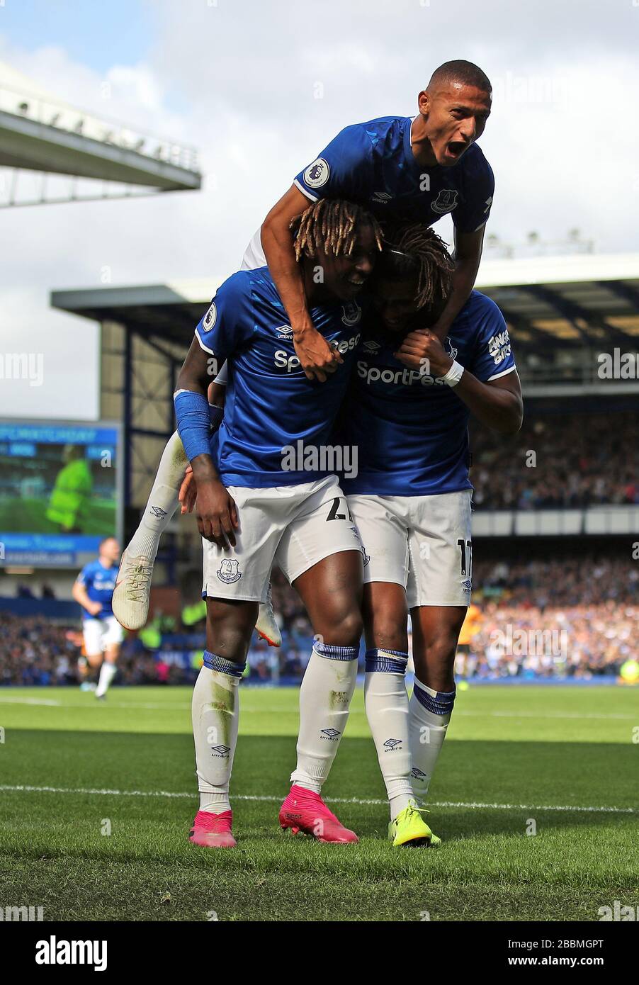 Everton's Richarlison (top) celebrates scoring his side's first goal of the game with team-mates Stock Photo