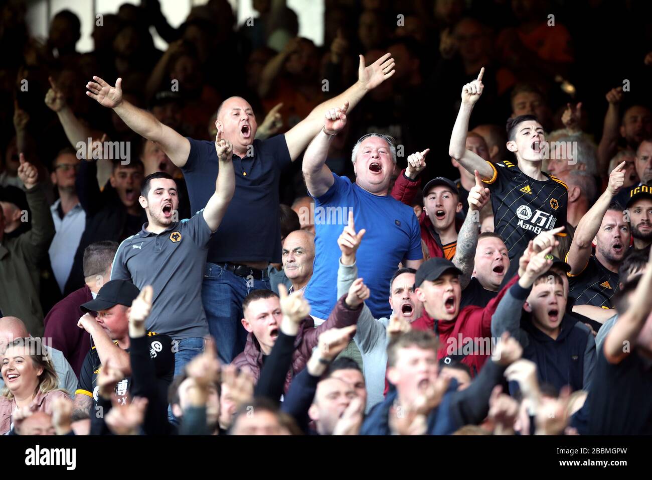Wolverhampton Wanders fans celebrate their side's first goal of the game, scored by Romain Saiss (not pictured) Stock Photo