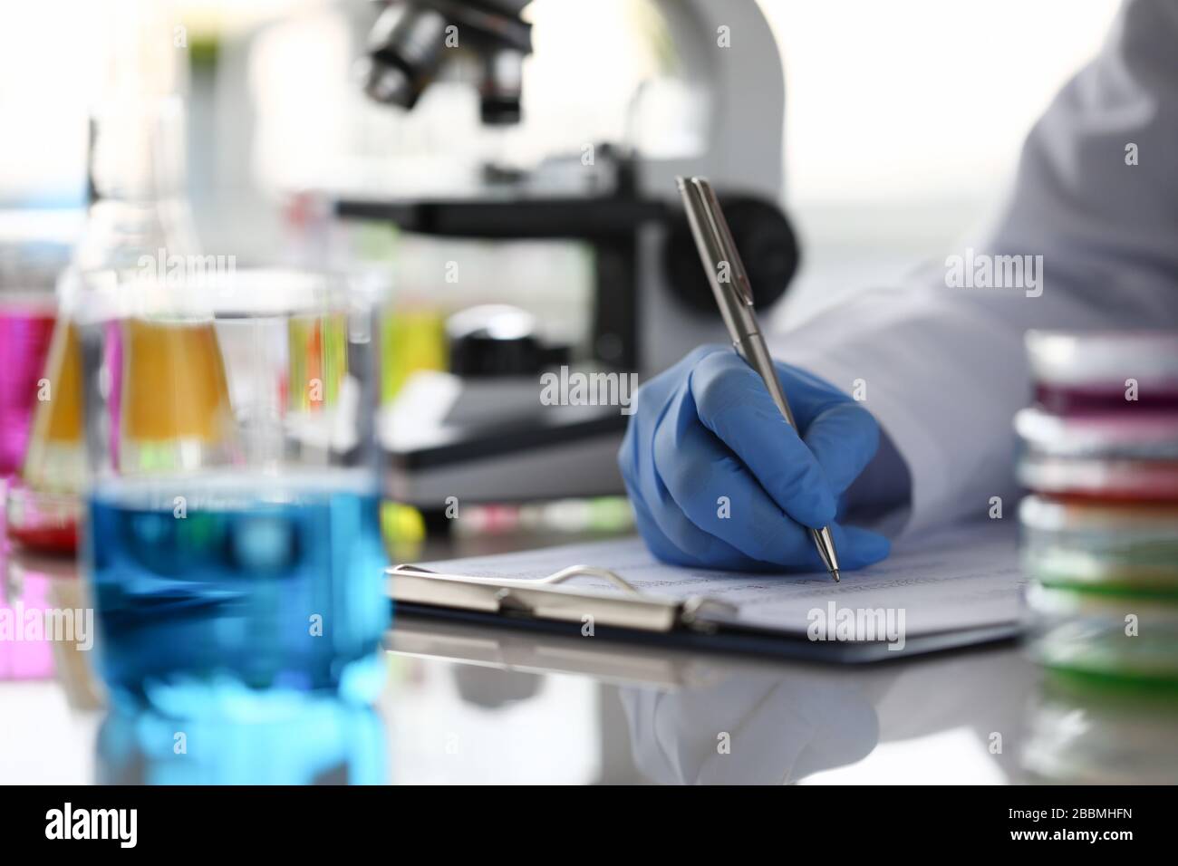 Assistant working in laboratory Stock Photo Alamy