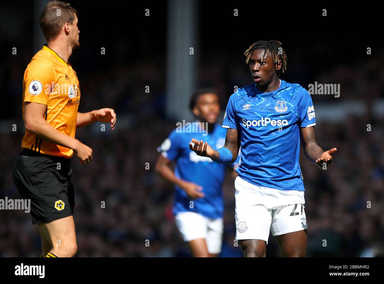 Everton's Moise Kean exchanges words with Wolverhampton Wanderers's Ryan Bennett Stock Photo