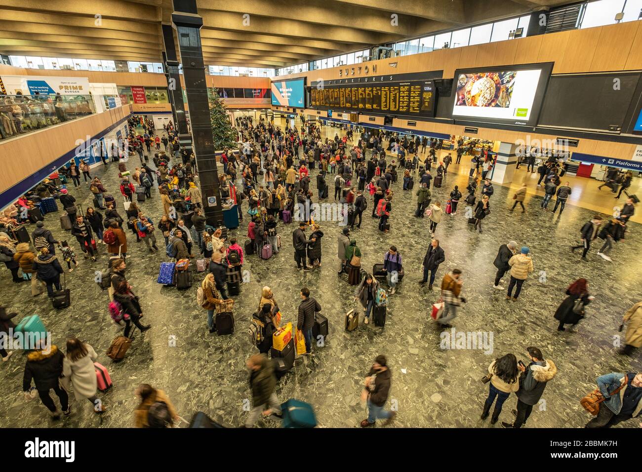 Euston Station main concourse- wide angle view of major railway terminus in central London Stock Photo