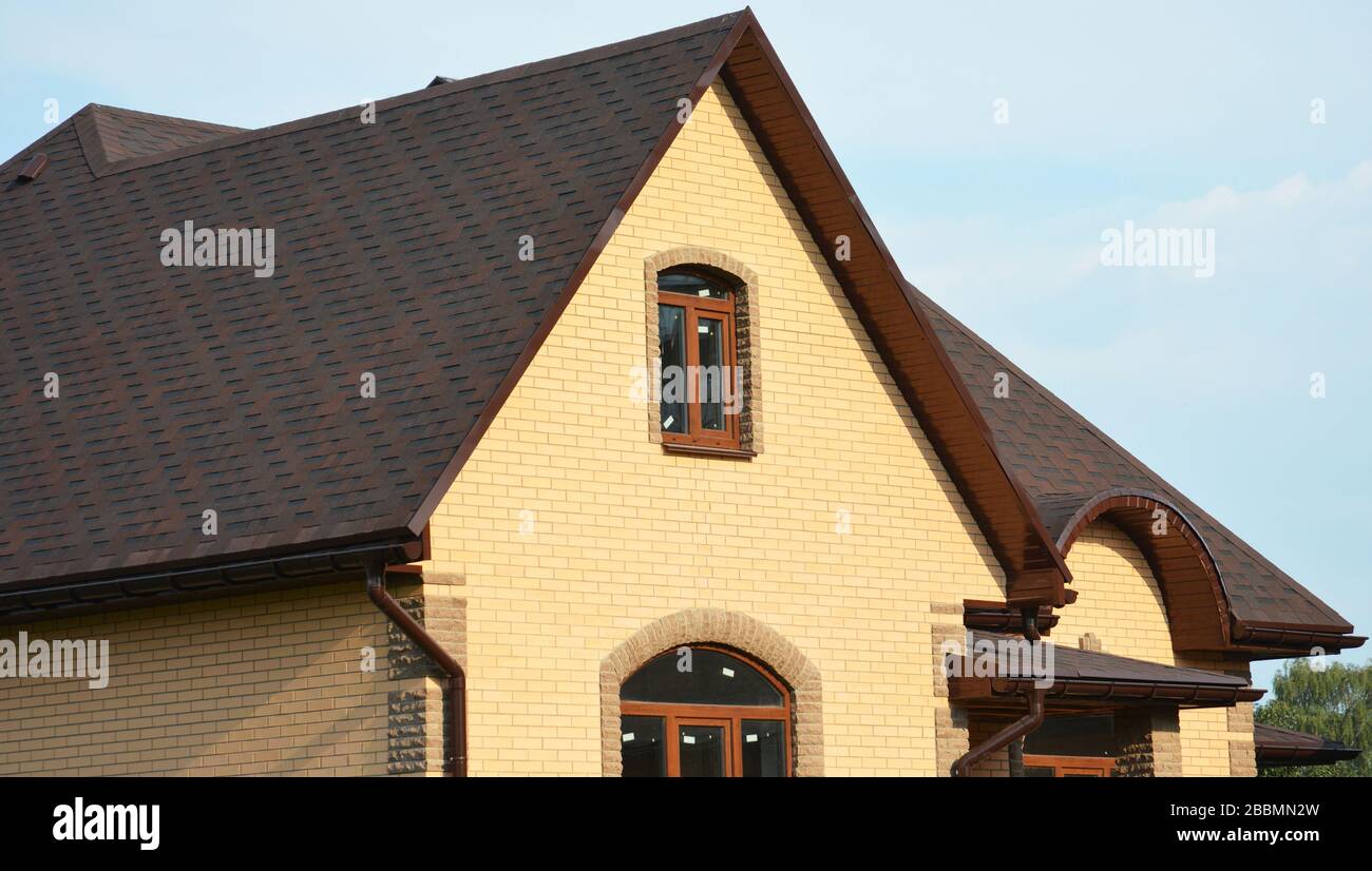 Asphalt shingles rooftop. Roofing construction rooftop house building