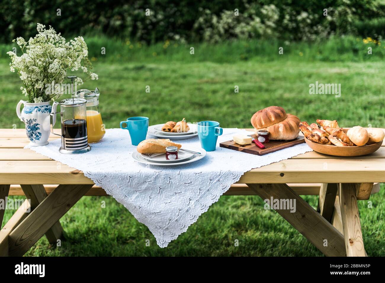 Glamping breakfast outdoors, eating alfresco. England Stock Photo