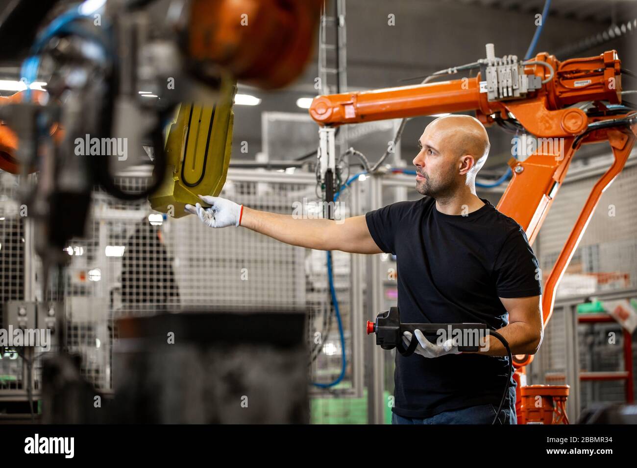Engineer repairing an automatic robot amrs in automotive, smart factory, industrial concept Stock Photo