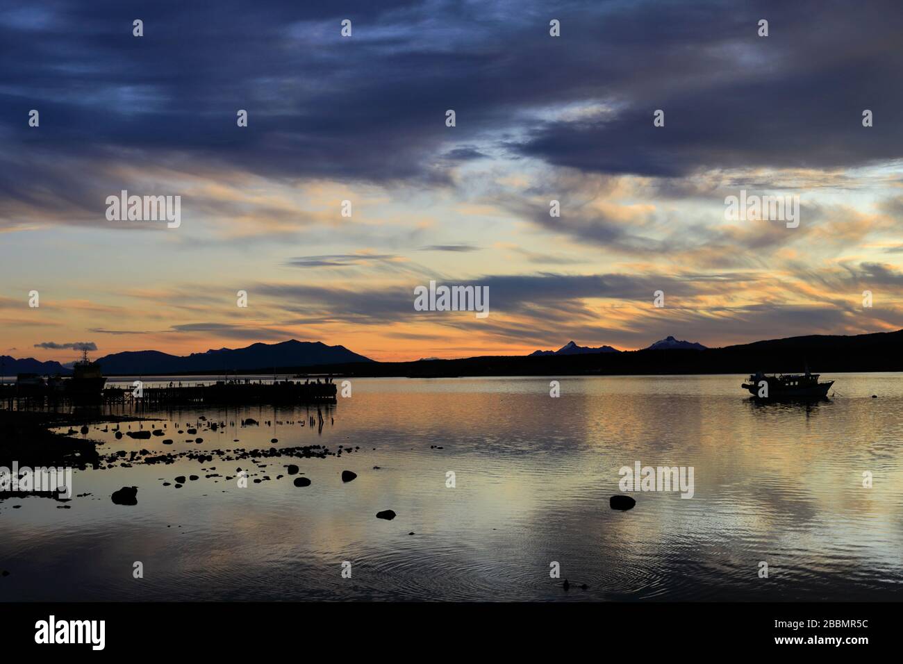 Sunset over the Gulf of Admiral Montt, Puerto Natales city, Patagonia, Chile, South America Stock Photo