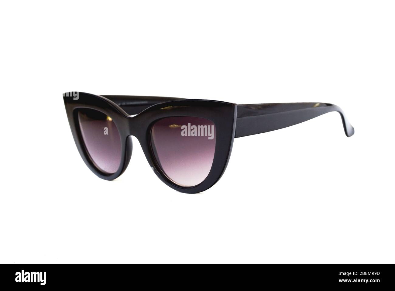 Black gradient cat eye sunglasses with thick frame at isolated white background, side view Stock