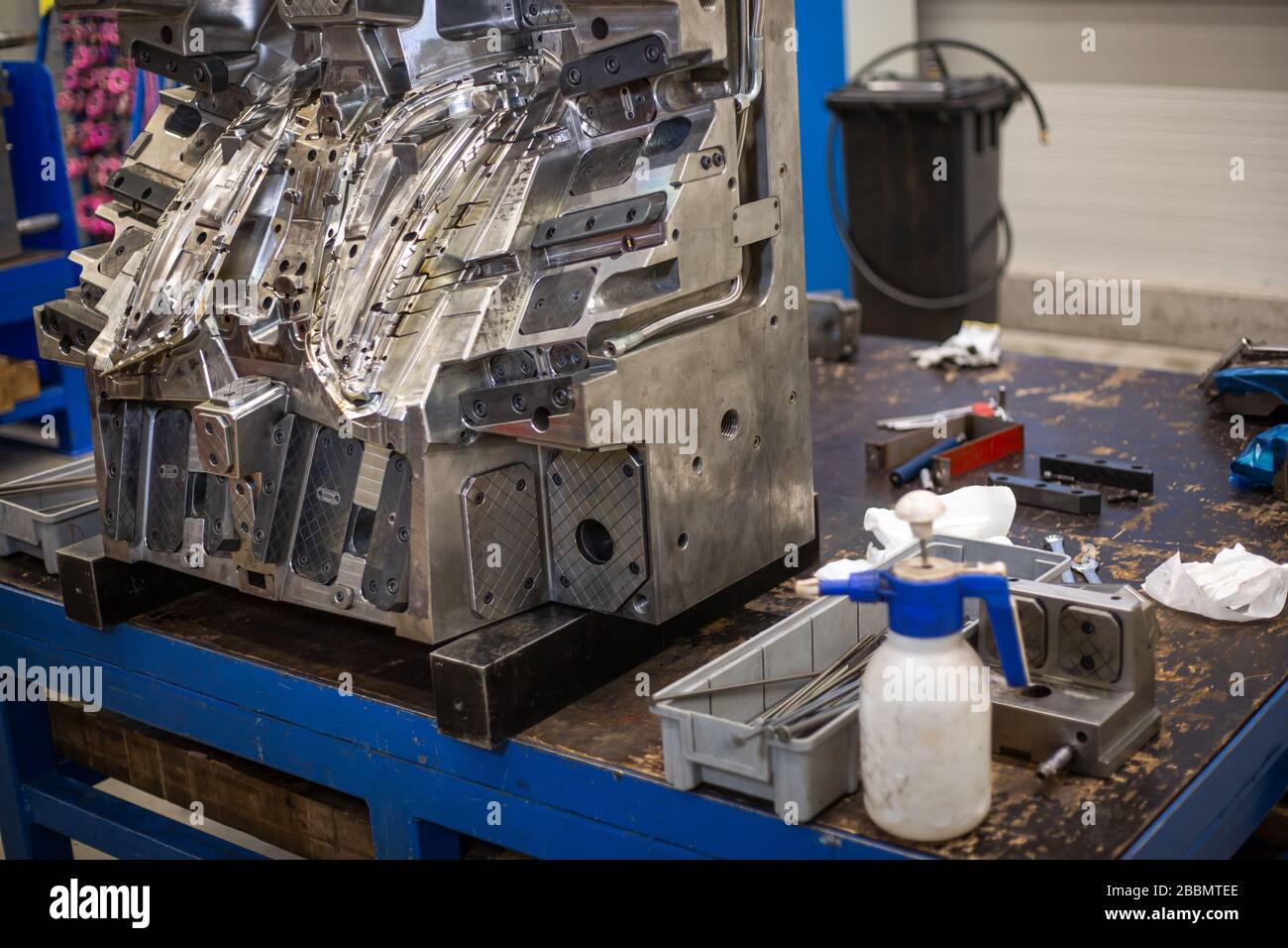injection mold under maintenance with huge arrenge of maintenance equipment, industrial concept Stock Photo