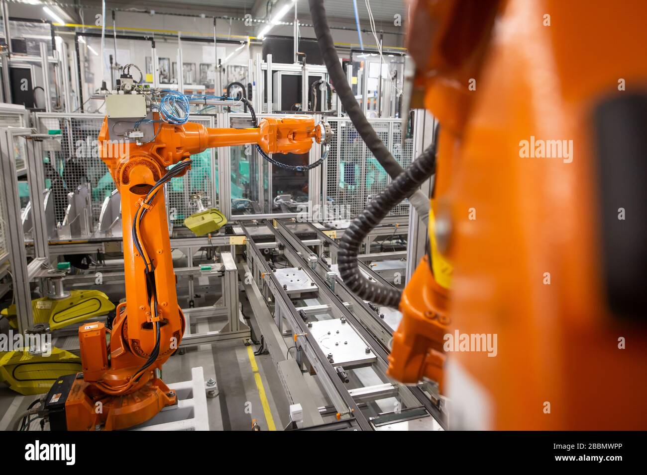 Automatic robots in the industrial factory for assembly automotive products, automotive concept Stock Photo