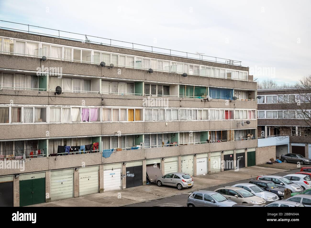 London, UK - December 9, 2019 - Communal car park next to a council block in south east London Stock Photo