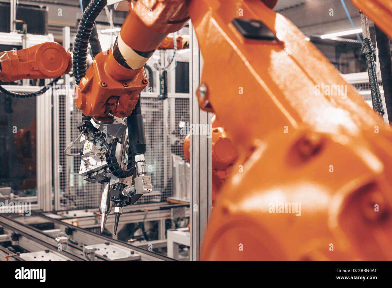 Stopped automatic arm robots in automotive industry, the global economic crisis in industry, industrial concept Stock Photo