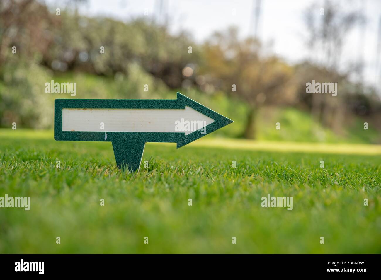 directional sign on golf course Stock Photo