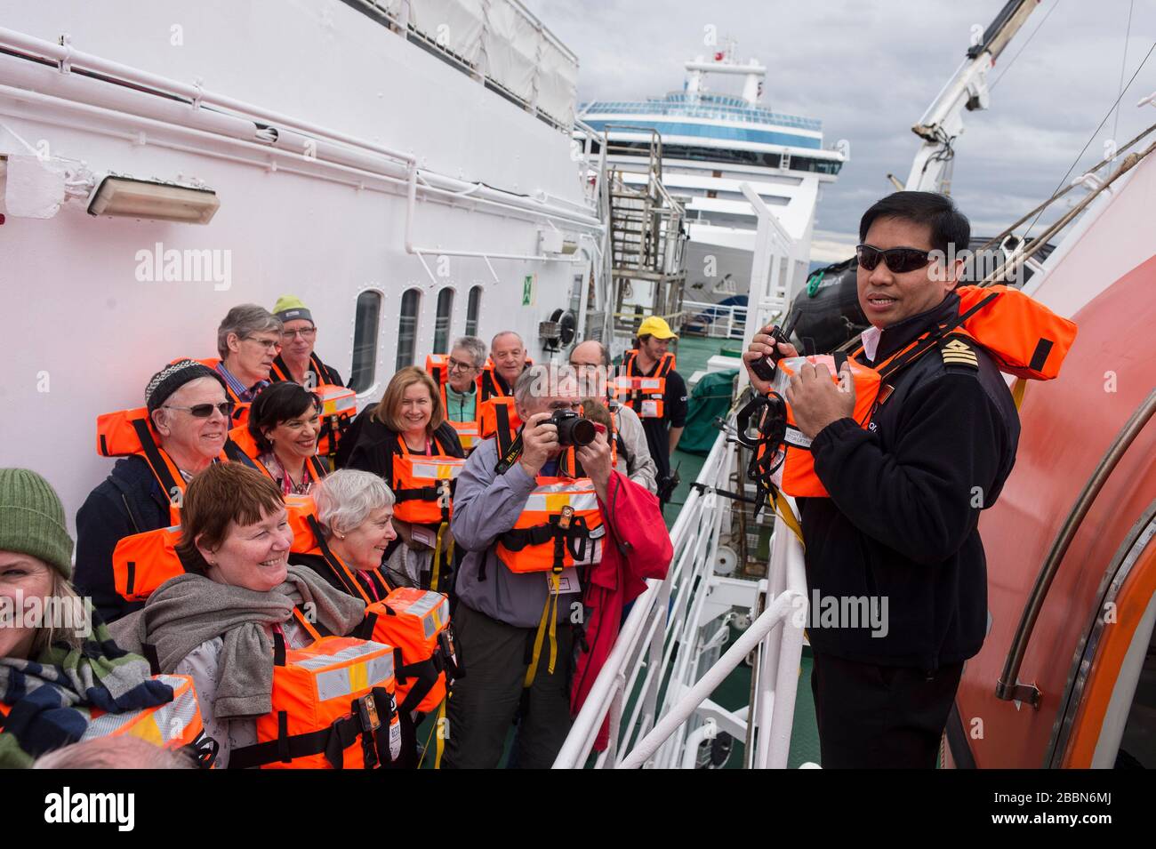 Practice muster station drill during emergency abandon ship training