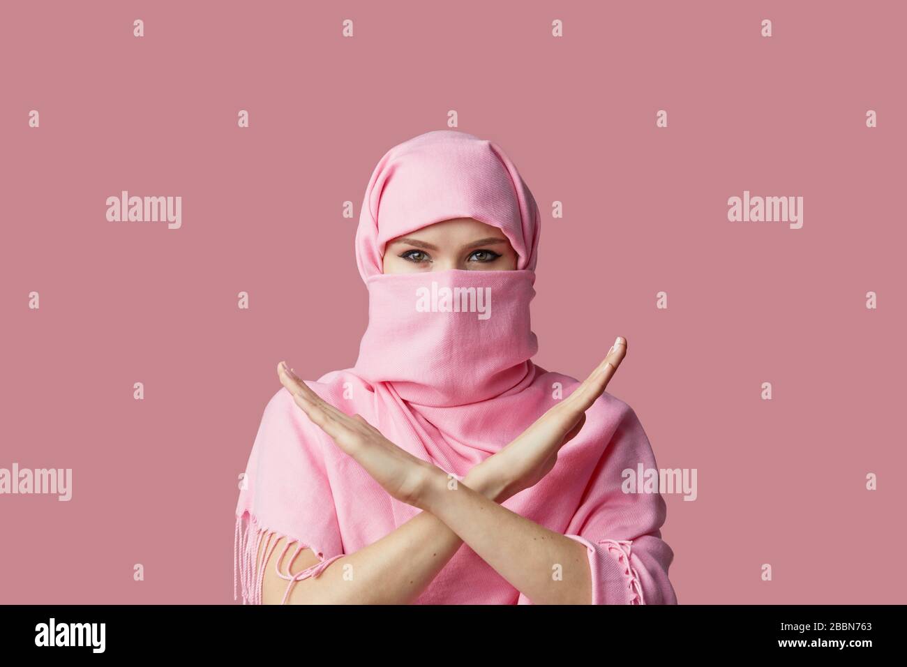 Young woman wearing pink hijab hi-res stock photography and images - Alamy