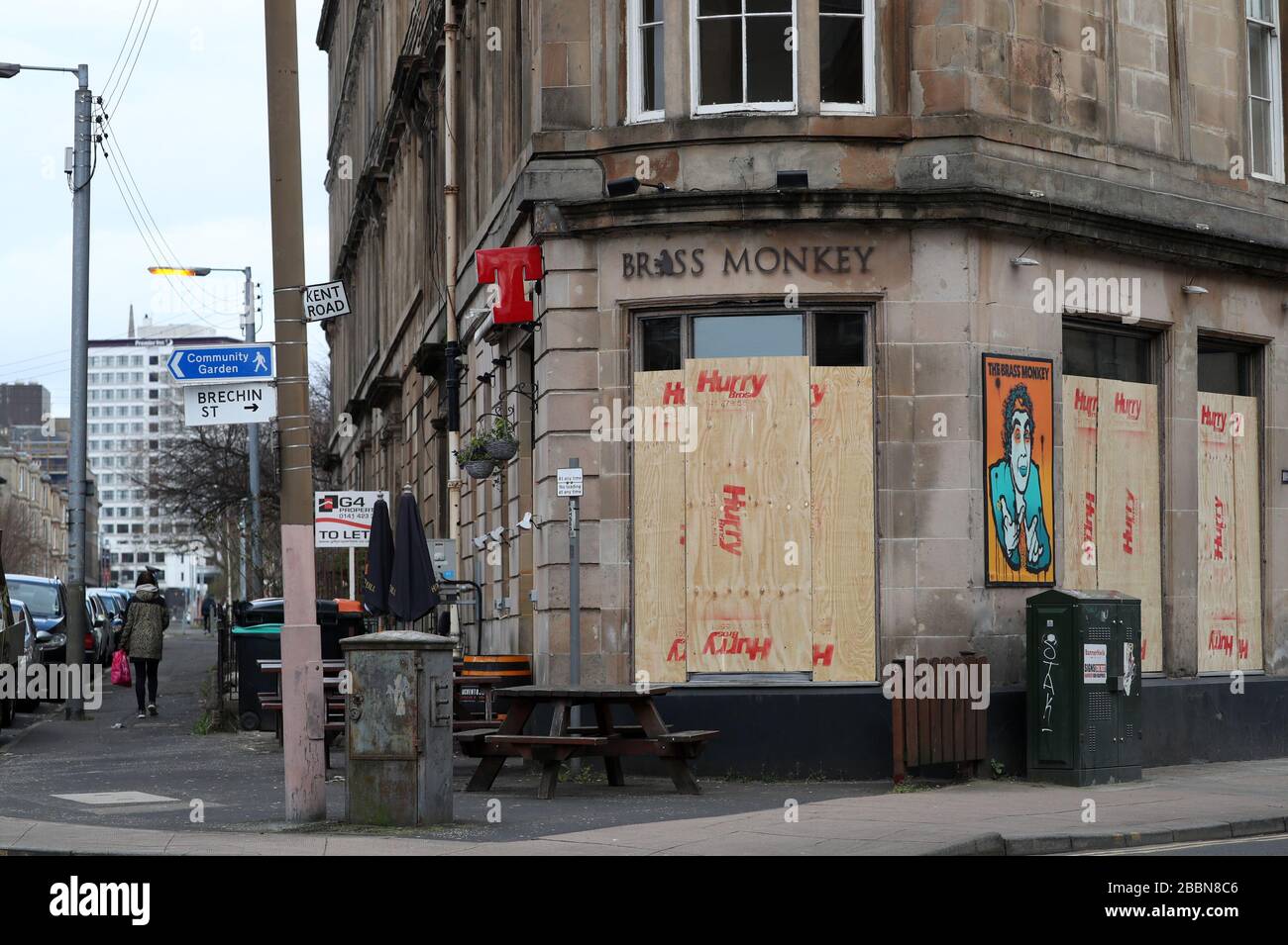 A boarded up Brass Monkey bar in Glasgow as the UK continues in