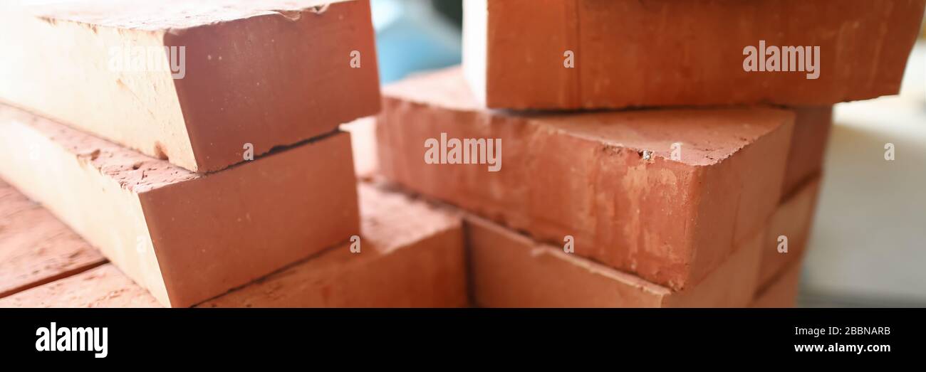 Building materials are on floor, stack red bricks Stock Photo