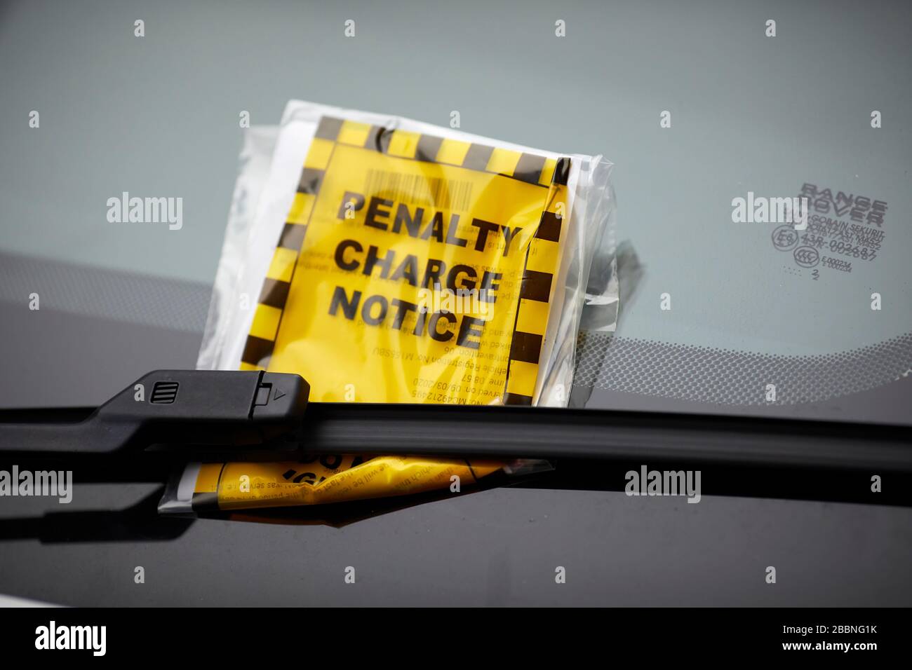 Fined parking ticket and car window hires stock photography and images