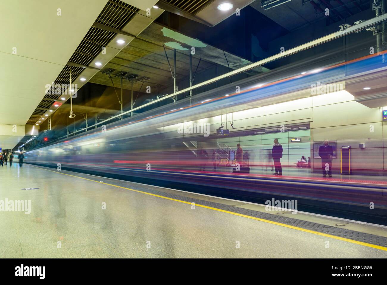 Motion blur from a long exposure of a Thameslink passenger train leaving Kings Cross Thameslink railway station Stock Photo