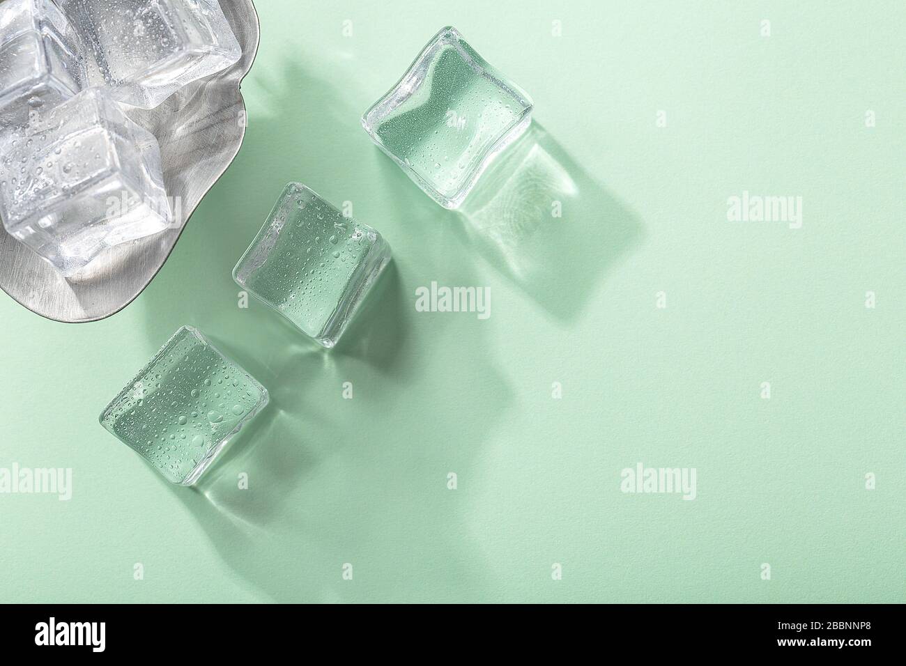 Colored banner with fresh ice cubes and reflections Stock Photo