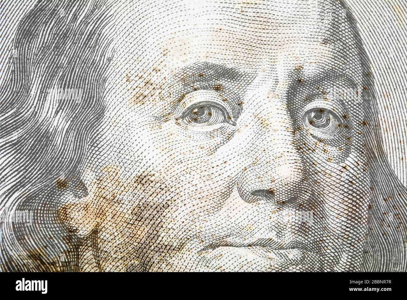 Close up view of 100 dollar banknote with fungus and mold. American Dollars Cash Money. Paper
