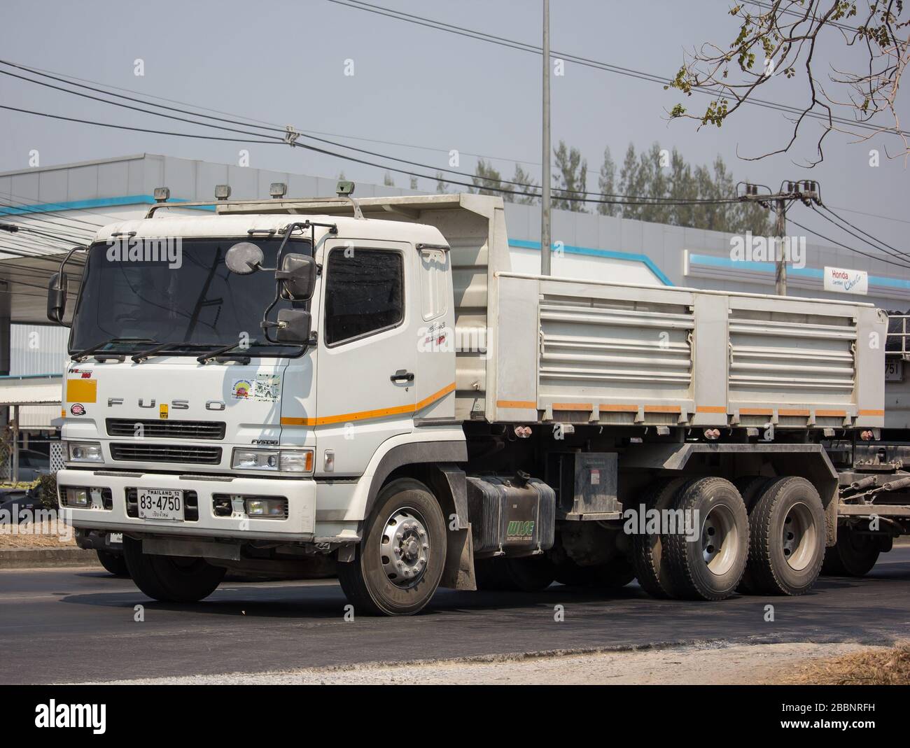 Chiangmai, Thailand - March  4 2020: Private Mitsubishi Fuso Dump Truck.  Photo at road no.121 about 8 km from downtown Chiangmai, thailand. Stock Photo