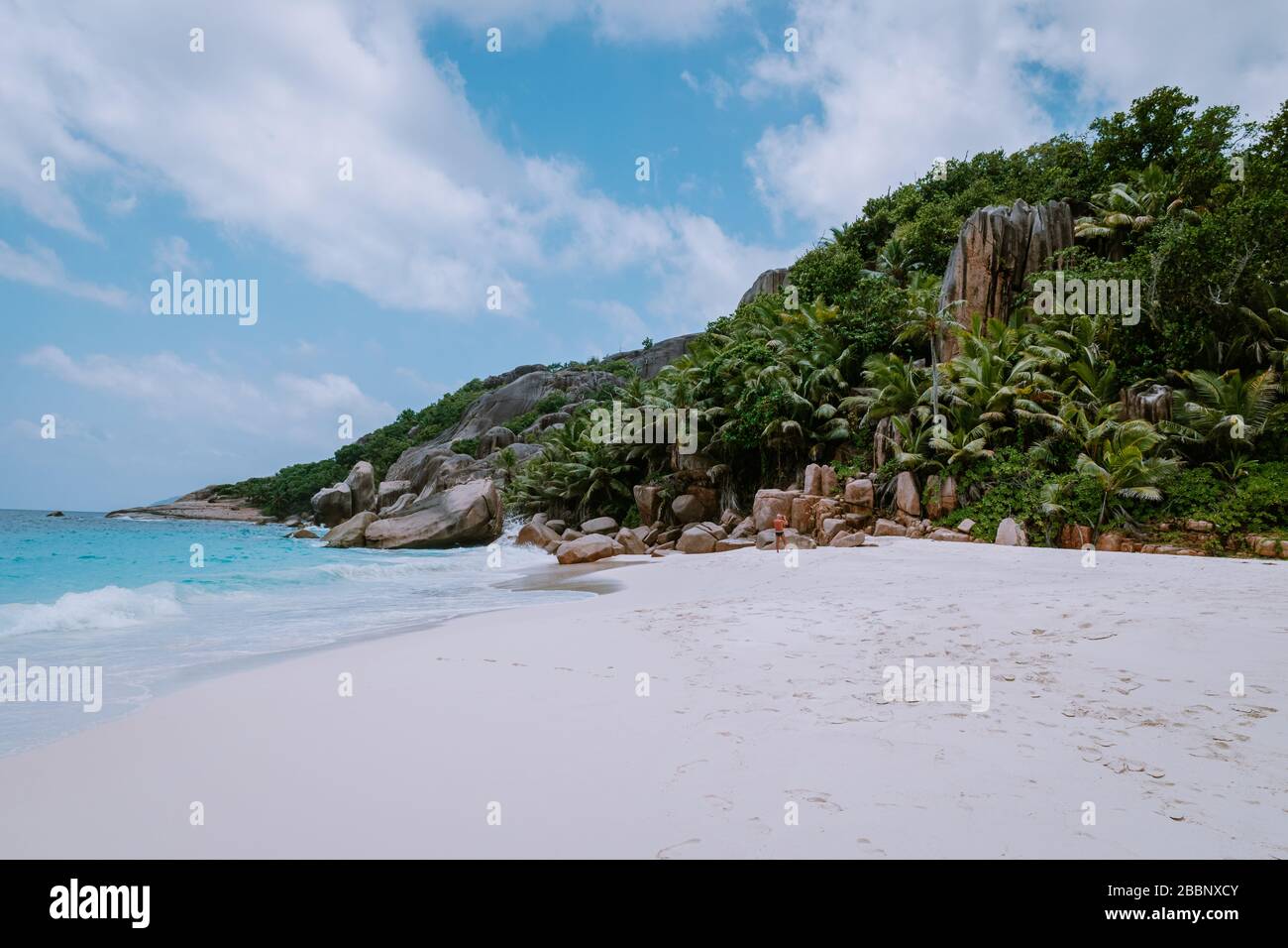 Stunning tropical beach at Seychelles, giant granit rocks on the beachs, Praslin Island Seychelles Cote dor beach Stock Photo