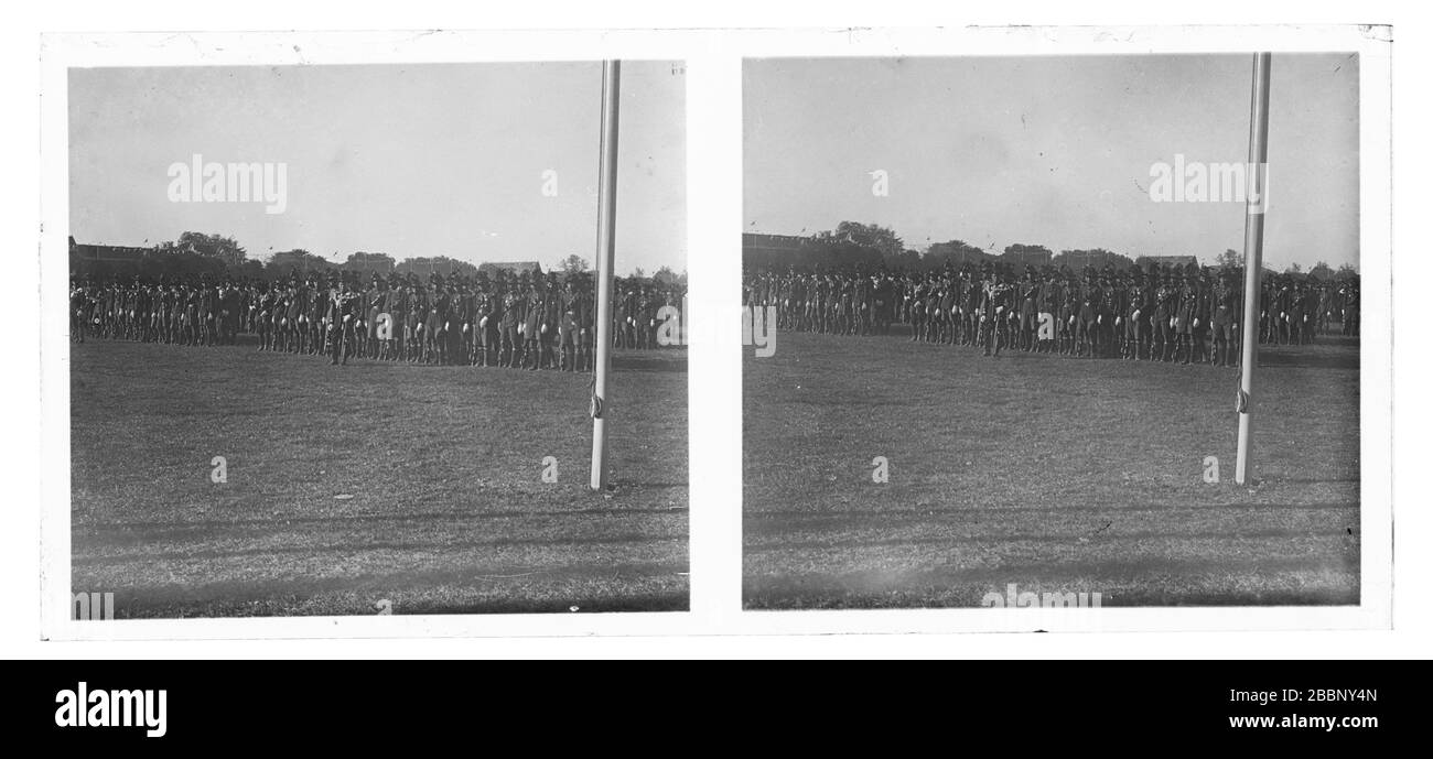 Royal Thai Armed Forces - soldiers in parade uniform lined up on a field for a festive event. Stereoscopic photograph  from  around the year 1910. Photograph on dry glass plate from the Herry W. Schaefer collection. Stock Photo