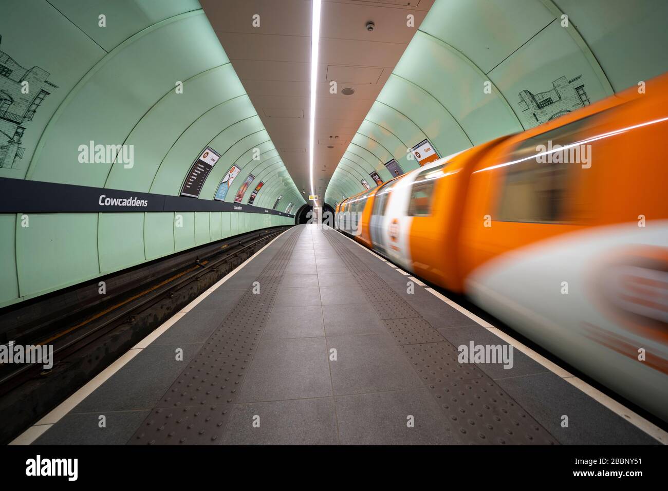 Glasgow, Scotland, UK. 1 April, 2020. Effects of Coronavirus lockdown on streets of Glasgow, Scotland. Empty platform as train on Glasgow Subway leaves station. Iain Masterton/Alamy Live News Stock Photo