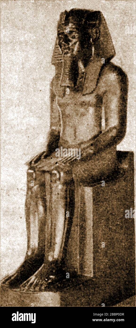 Egyptology -  A 1920 printed image showing  a statue of the father of Akenhaten's  (aka   Echnaton, Akhenaton,  Ikhnaton,  Khuenaten, Amenhotep IV ) Amenhotep III Stock Photo