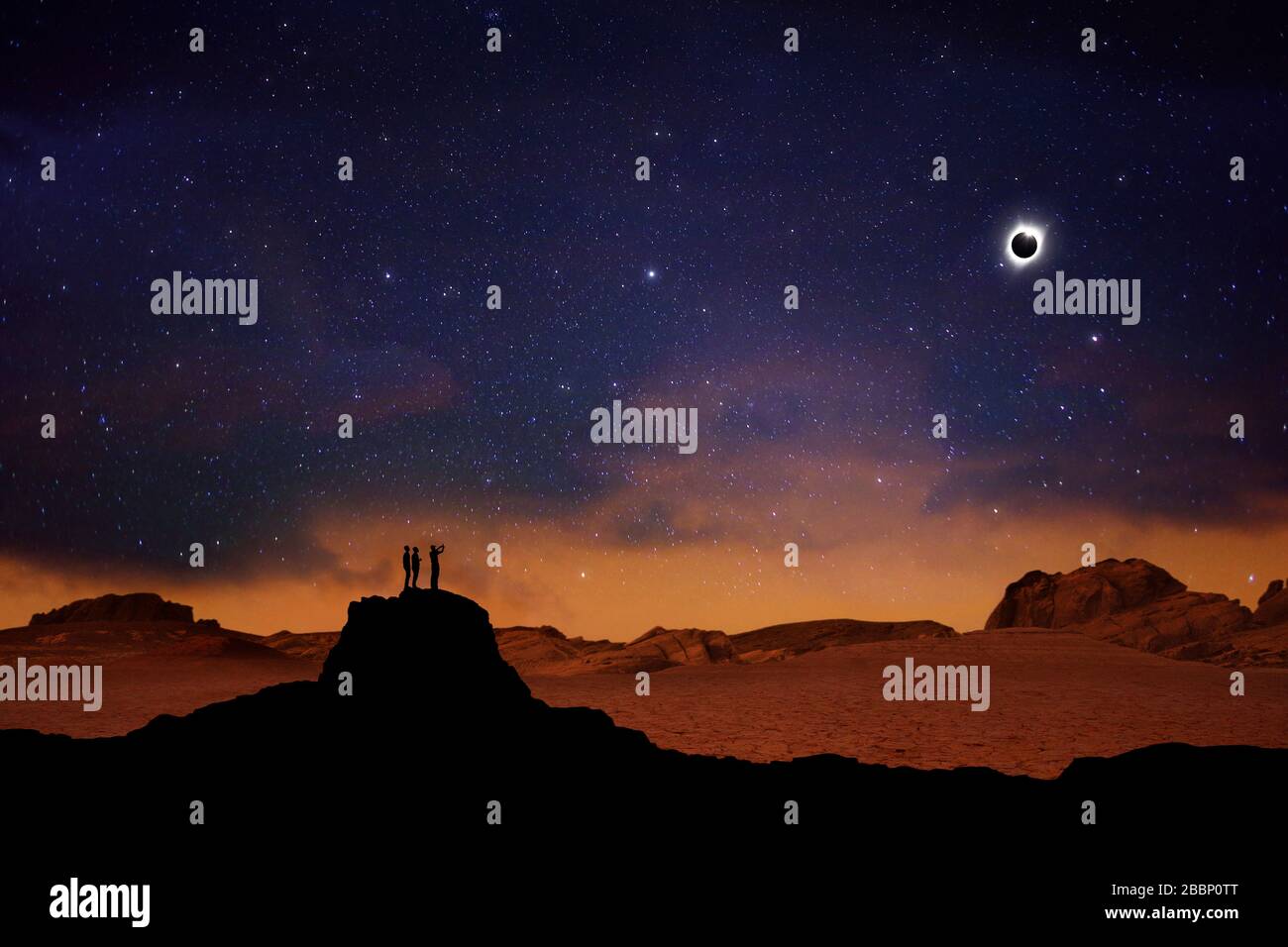 Surrealistic image of three people viewing an eclipse. Stock Photo