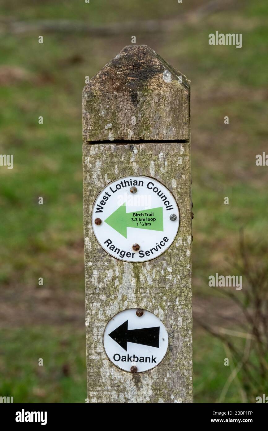 West Lothian Ranger Service sign on a post in Almondell and Calderwood Country Park, West Lothian Scotland. Stock Photo