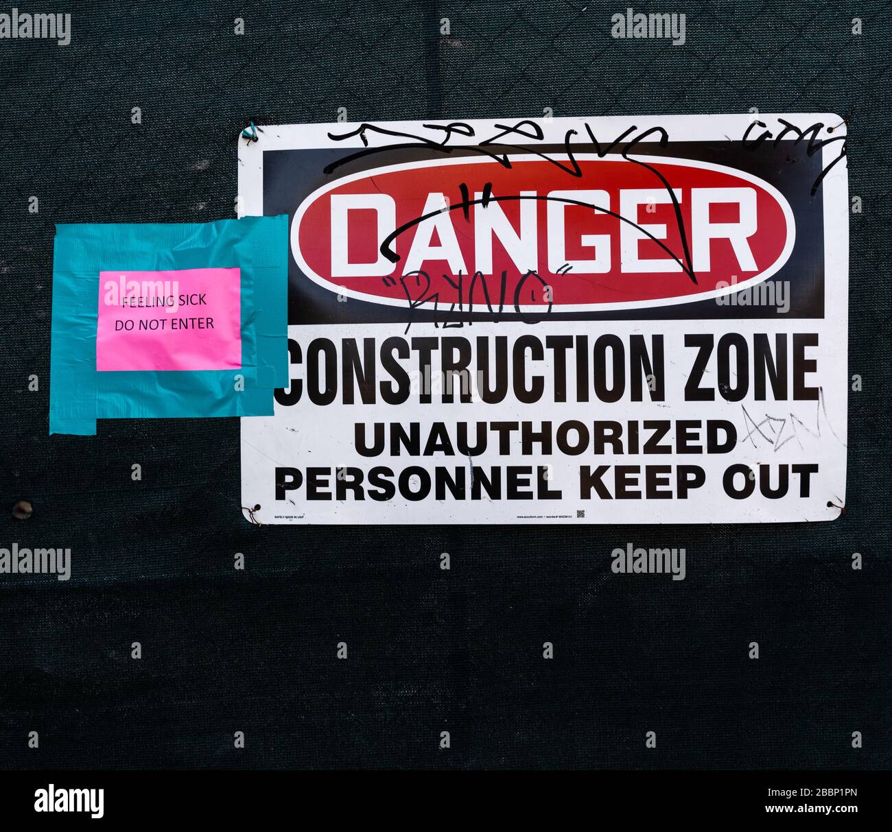 Sign at entrance to construction site that reads, 'feeling sick/do not enter.' Stock Photo