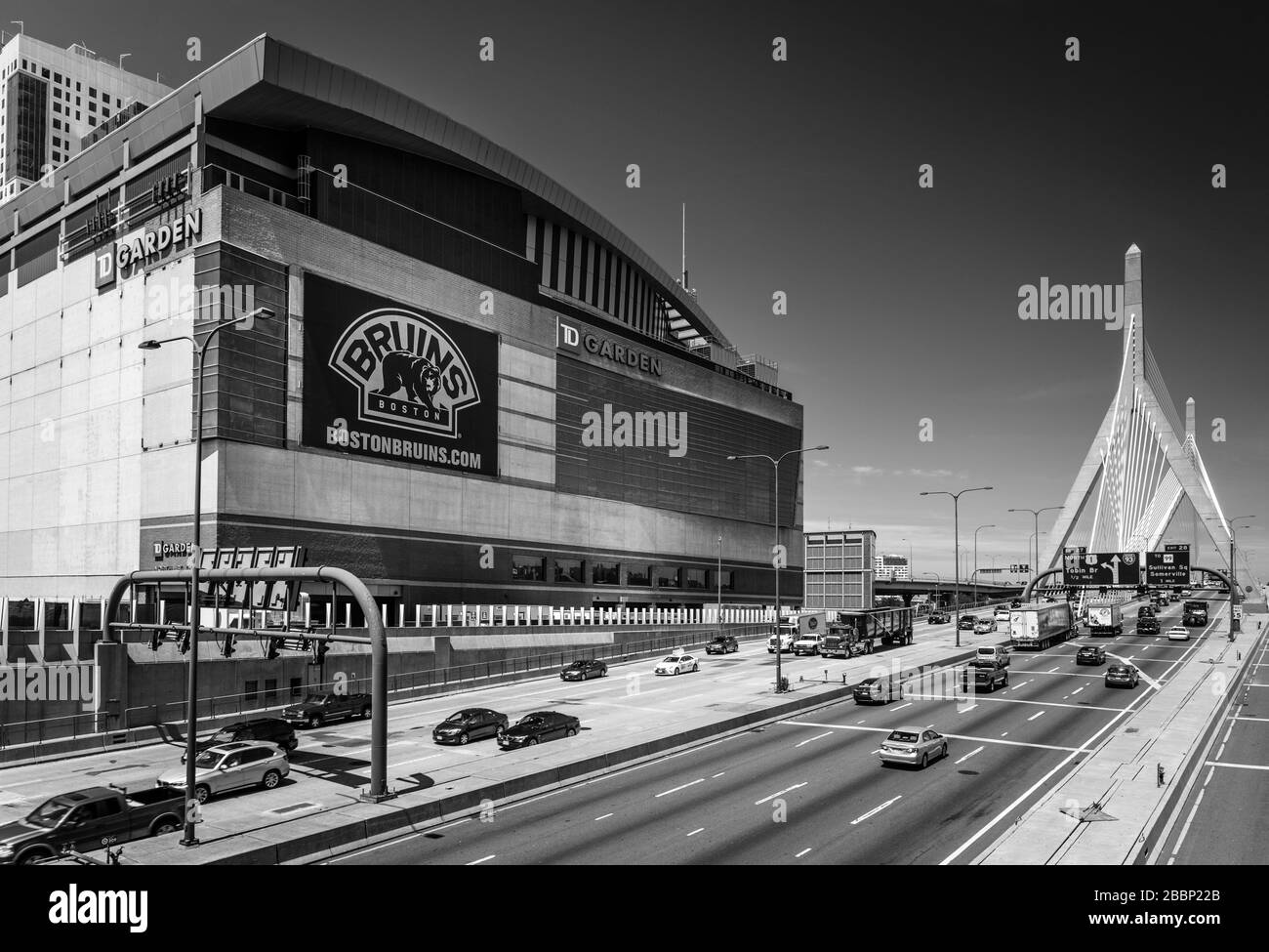 Boston - June 2016, Massachusetts, USA: Boston Bruins stadium (TD Garden) and highway with traffic on Leonard P. Zakim Bunker Hill Memorial Bridge Stock Photo