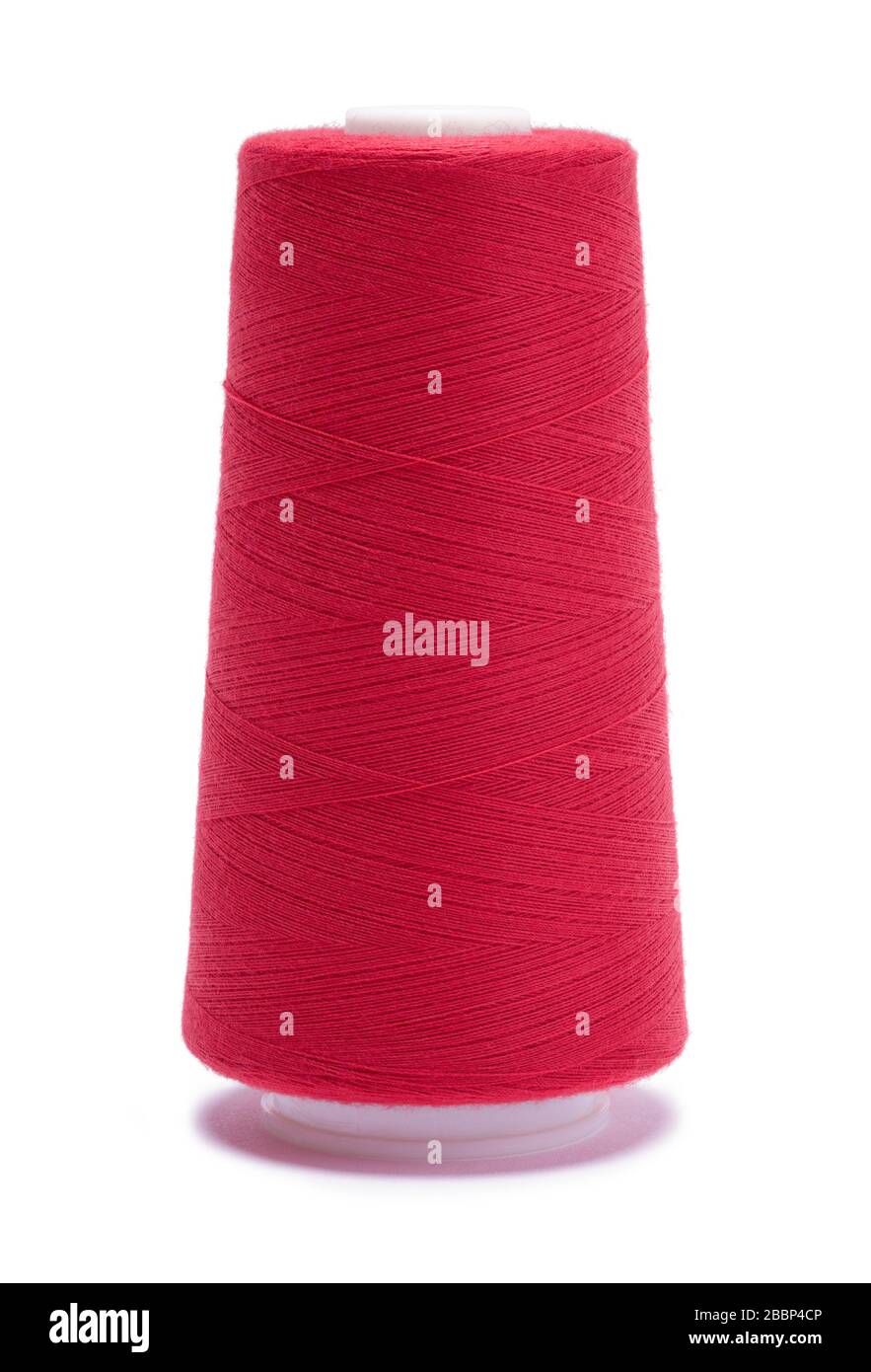 Large Red Thread Spool Isolated on White. Stock Photo