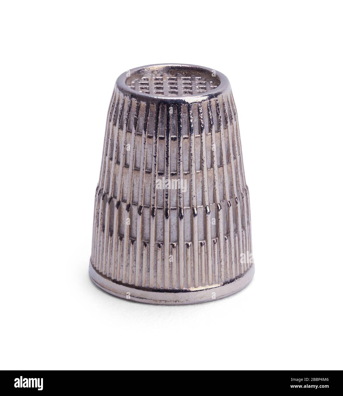 Old Metal Thimble Isolated on White Background. Stock Photo