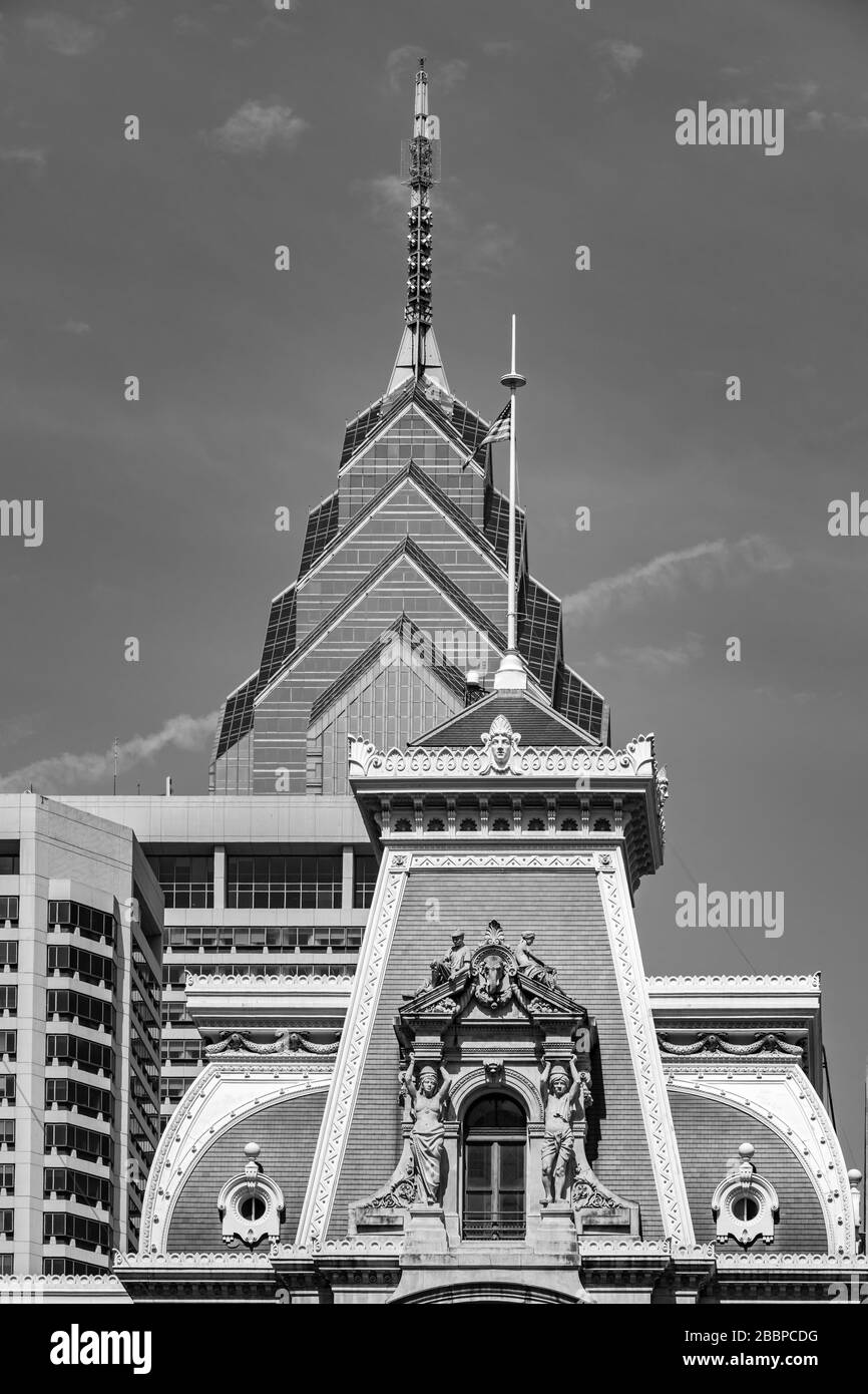 The slated mansard roof of City Hall, complete with sculptures & the top of One Liberty Place, which replaced it as Philadelphia's tallest building Stock Photo