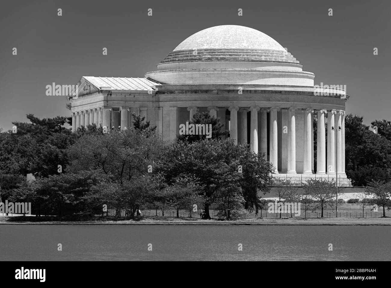 The white marble pantheon of the Jefferson Memorial on the banks of the Potomac Tidal Basin in Washington DC Stock Photo