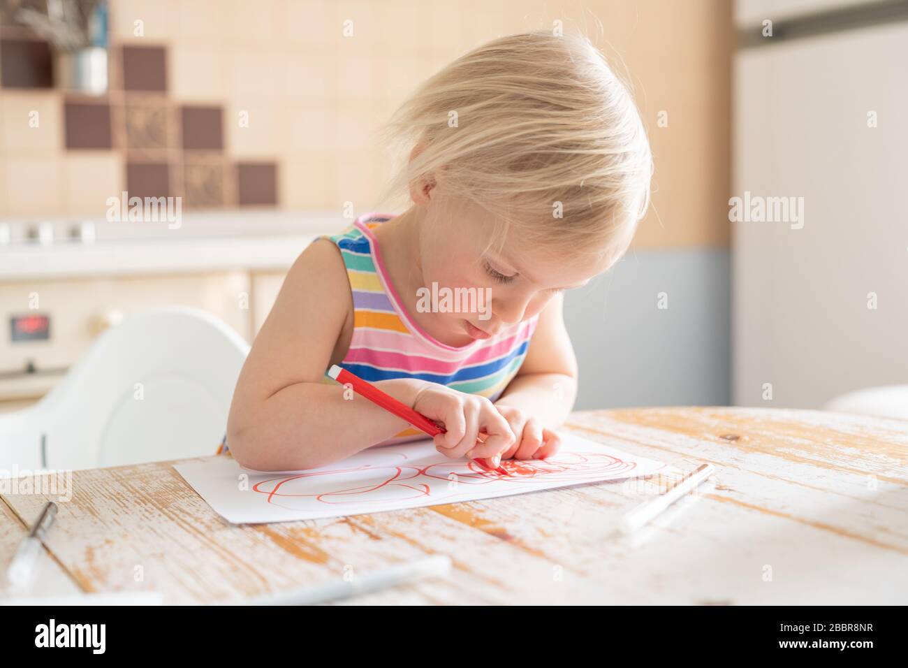 Covid lockdown - girl learns to draw online during self-isolation Stock Photo