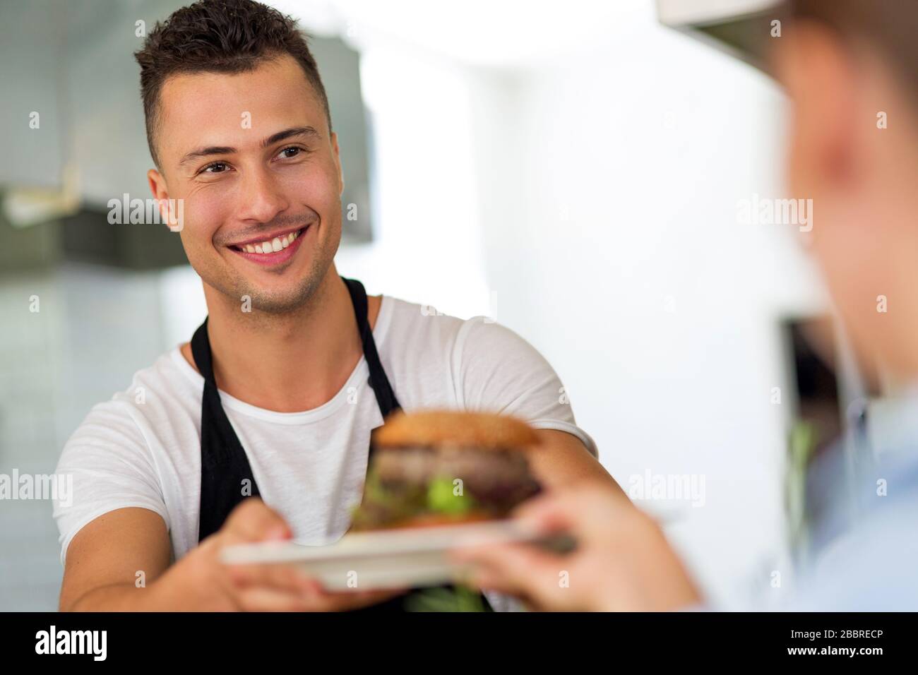 Professional chef in industrial kitchen Stock Photo