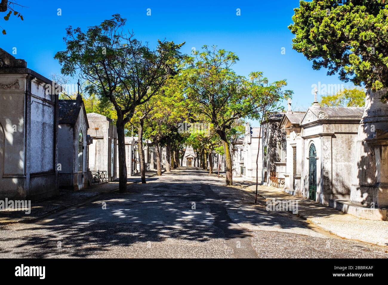 Alleyway between mausoleums in Cemitério do Alto de São João. Stock Photo